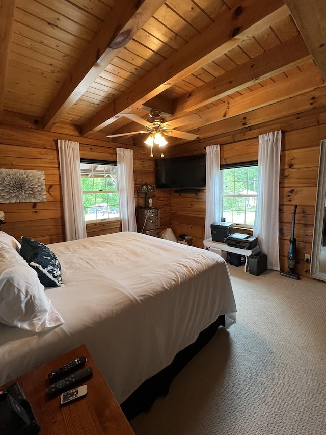 225 Bill Hunter Rd, Celina, TN 38551 - carpeted bedroom featuring wood walls, multiple windows, wood ceiling with exposed beams, and ceiling fan