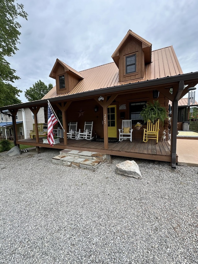 225 Bill Hunter Rd, Celina, TN 38551 - chalet / cabin with metal roof and covered porch