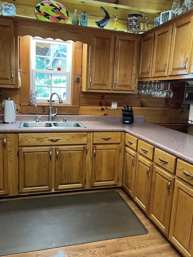 225 Bill Hunter Rd, Celina, TN 38551 - kitchen featuring a sink, brown cabinetry, and light countertops