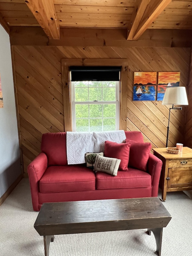 225 Bill Hunter Rd, Celina, TN 38551 - living area with carpet, wooden walls, and wood ceiling with exposed beams