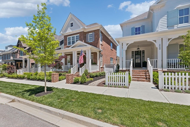 2043 Nathaniel Rd, Franklin, TN 37064 - view of front facade with a porch and a front lawn