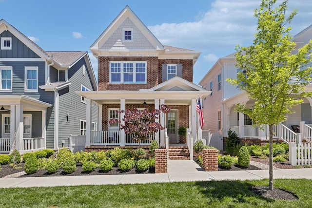 2043 Nathaniel Rd, Franklin, TN 37064 - view of front facade featuring brick siding and covered porch