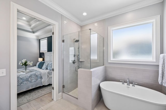 2043 Nathaniel Rd, Franklin, TN 37064 - ensuite bathroom featuring crown molding, a stall shower, a freestanding bath, wood finished floors, and recessed lighting