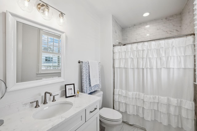 2043 Nathaniel Rd, Franklin, TN 37064 - full bath with vanity, toilet, marble look tile flooring, recessed lighting, and shower / tub combo with curtain