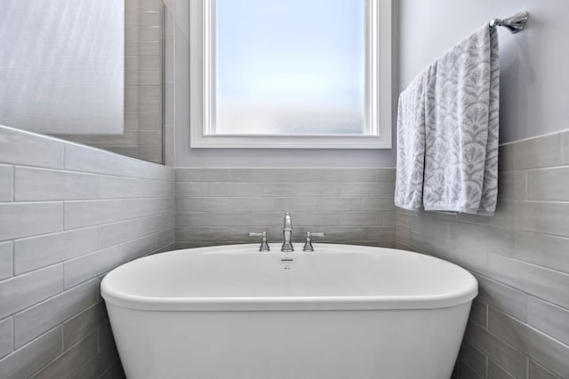 2043 Nathaniel Rd, Franklin, TN 37064 - bathroom with a freestanding bath and tile walls