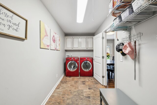 200 Lindsey Hollow Rd, Gallatin, TN 37066 - laundry room with stone finish flooring, washing machine and dryer, cabinet space, and baseboards