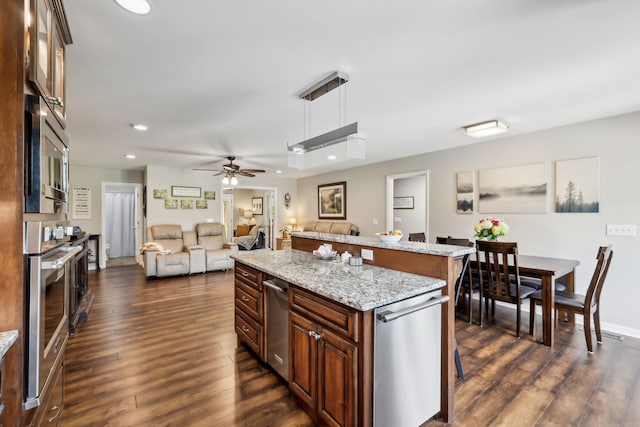 200 Lindsey Hollow Rd, Gallatin, TN 37066 - kitchen with a breakfast bar, open floor plan, dark wood-type flooring, recessed lighting, and a ceiling fan