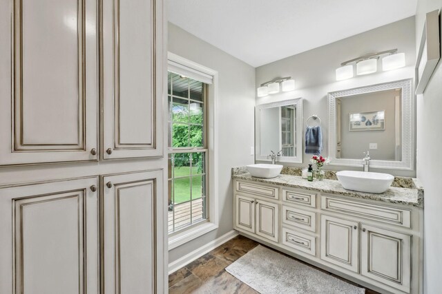 200 Lindsey Hollow Rd, Gallatin, TN 37066 - bathroom with double vanity and baseboards