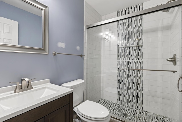 1054 Cragfront Est Loop, Gallatin, TN 37066 - bathroom featuring toilet, a shower stall, and vanity