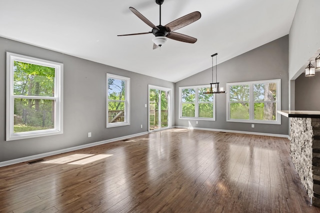 1054 Cragfront Est Loop, Gallatin, TN 37066 - unfurnished living room featuring a ceiling fan, healthy amount of natural light, hardwood / wood-style flooring, and high vaulted ceiling