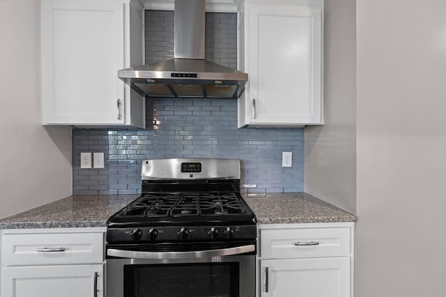 1054 Cragfront Est Loop, Gallatin, TN 37066 - kitchen with stainless steel range with gas cooktop, wall chimney exhaust hood, white cabinets, and tasteful backsplash