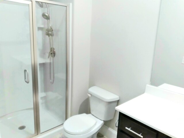 168 Cobbler Cir, Hendersonville, TN 37075 - bathroom with vanity, a stall shower, and toilet