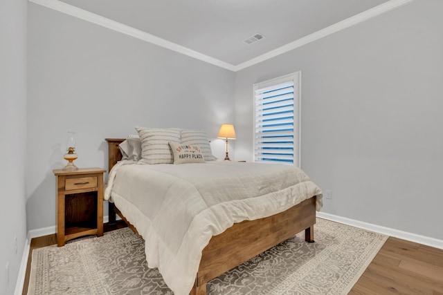 1815 Humphreys Gln, Spring Hill, TN 37174 - bedroom with ornamental molding, baseboards, and wood finished floors