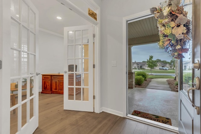 1815 Humphreys Gln, Spring Hill, TN 37174 - entryway featuring french doors, wood finished floors, baseboards, and crown molding