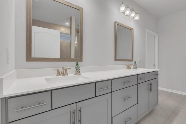 1815 Humphreys Gln, Spring Hill, TN 37174 - bathroom featuring double vanity, baseboards, and tile patterned flooring