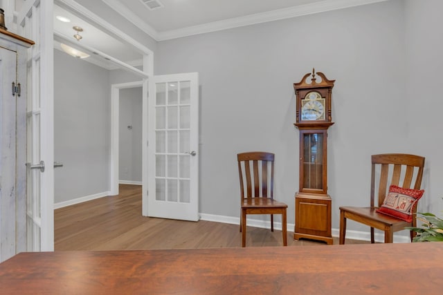 1815 Humphreys Gln, Spring Hill, TN 37174 - living area featuring french doors, wood finished floors, ornamental molding, and baseboards