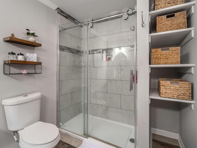 7119 Littlejohn Ln, Fairview, TN 37062 - full bathroom with toilet, a shower stall, and crown molding