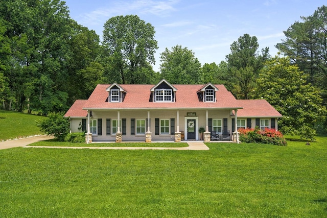 7119 Littlejohn Ln, Fairview, TN 37062 - cape cod home with covered porch and a front lawn