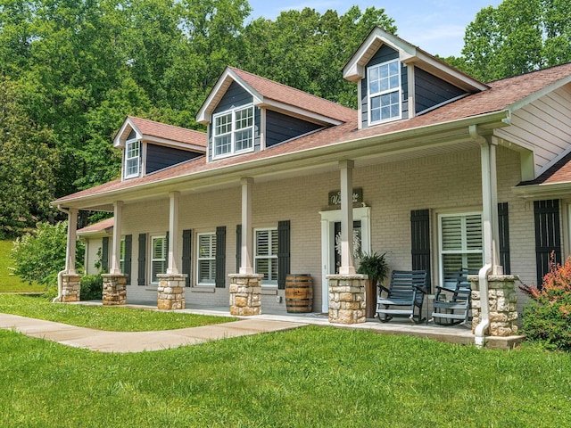 7119 Littlejohn Ln, Fairview, TN 37062 - view of front facade featuring a porch, a front yard, and roof with shingles