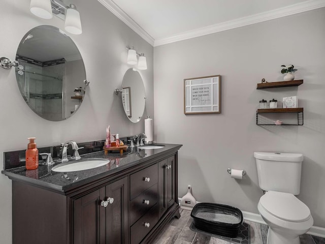 7119 Littlejohn Ln, Fairview, TN 37062 - bathroom featuring crown molding, baseboards, double vanity, toilet, and a shower