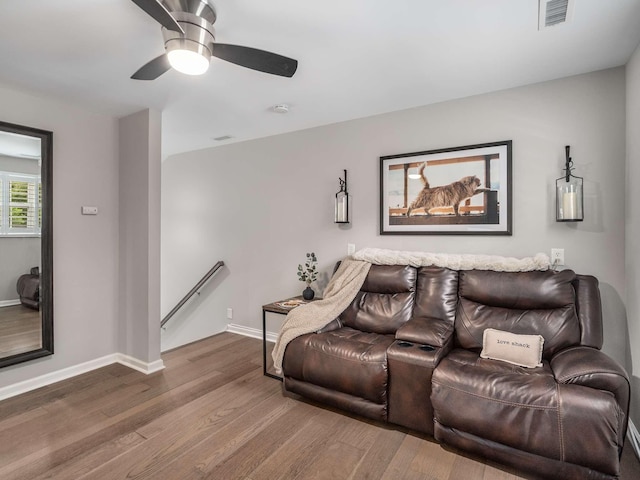 7119 Littlejohn Ln, Fairview, TN 37062 - living room with wood finished floors, a ceiling fan, and baseboards