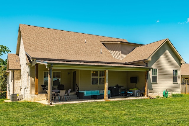 725B N Russell St, Portland, TN 37148 - rear view of property featuring outdoor lounge area, a shingled roof, and a patio