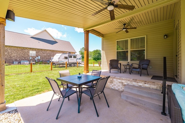 725B N Russell St, Portland, TN 37148 - view of patio with outdoor dining area, ceiling fan, and cooling unit