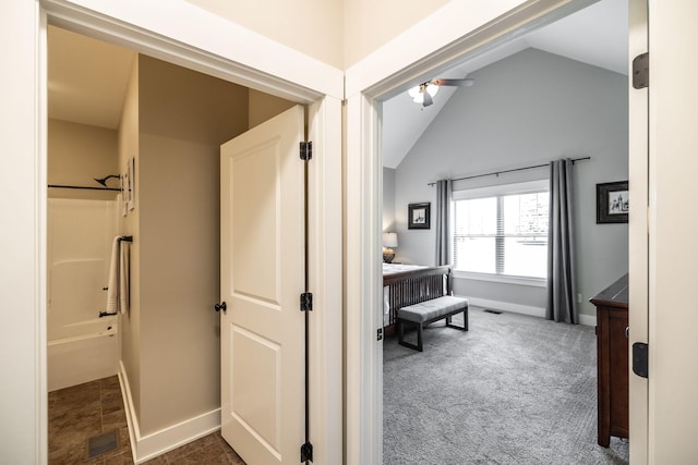 725B N Russell St, Portland, TN 37148 - full bath with lofted ceiling, baseboards, and bathing tub / shower combination