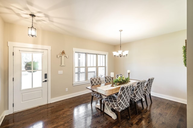 725B N Russell St, Portland, TN 37148 - dining room with a chandelier, dark wood finished floors, and baseboards