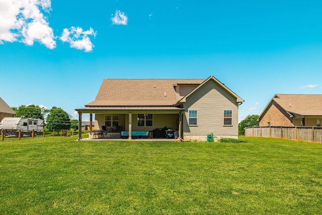 725B N Russell St, Portland, TN 37148 - rear view of property featuring a patio and a shingled roof