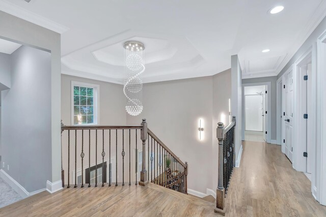 3168 Appian Way, Spring Hill, TN 37174 - hall featuring an upstairs landing, wood finished floors, a chandelier, ornamental molding, and recessed lighting