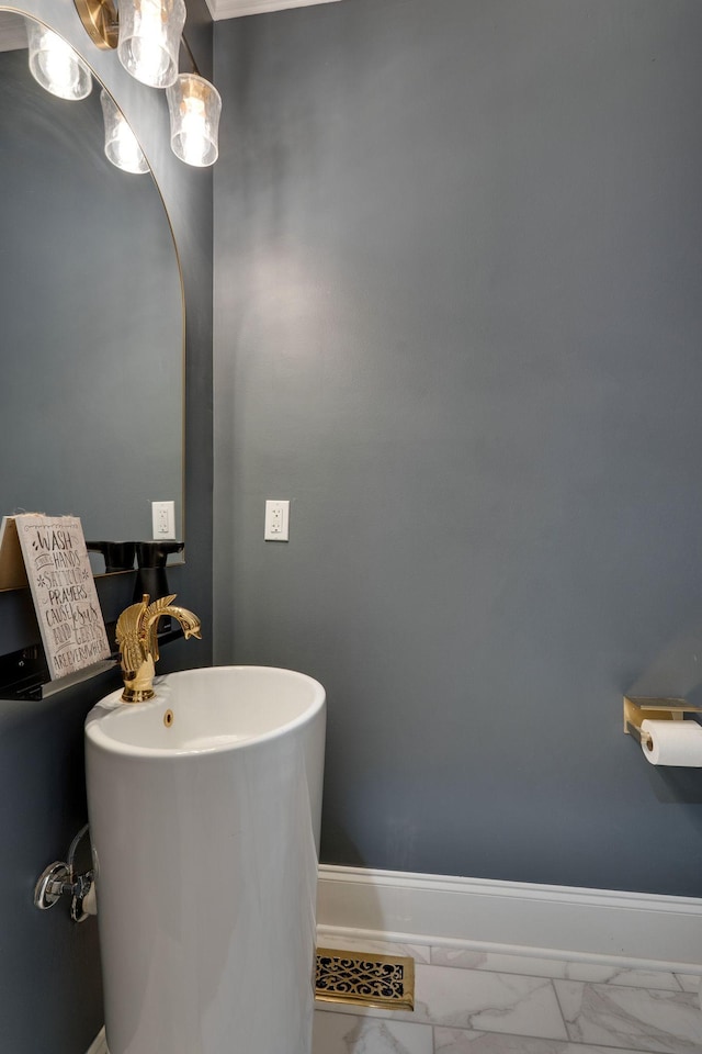 3168 Appian Way, Spring Hill, TN 37174 - bathroom featuring marble look tile flooring, baseboards, and a sink