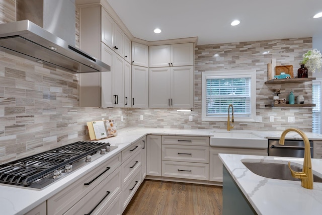 3168 Appian Way, Spring Hill, TN 37174 - kitchen with wall chimney exhaust hood, stainless steel gas stovetop, a sink, tasteful backsplash, and recessed lighting