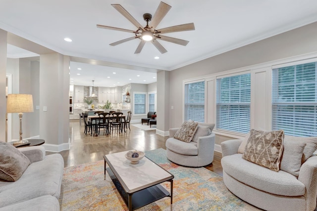 3168 Appian Way, Spring Hill, TN 37174 - living room with ceiling fan, light wood-type flooring, baseboards, crown molding, and recessed lighting