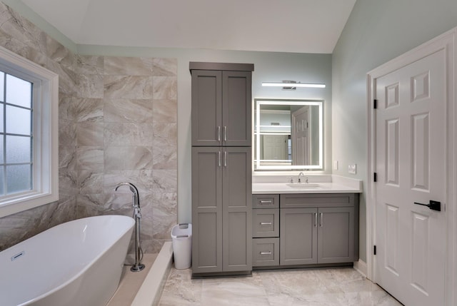 3168 Appian Way, Spring Hill, TN 37174 - bathroom featuring a soaking tub, vanity, and marble finish floors