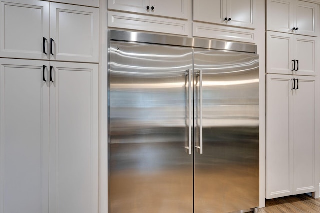 3168 Appian Way, Spring Hill, TN 37174 - kitchen featuring built in fridge and white cabinets