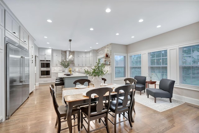 3168 Appian Way, Spring Hill, TN 37174 - dining space featuring recessed lighting, light wood-style flooring, and baseboards