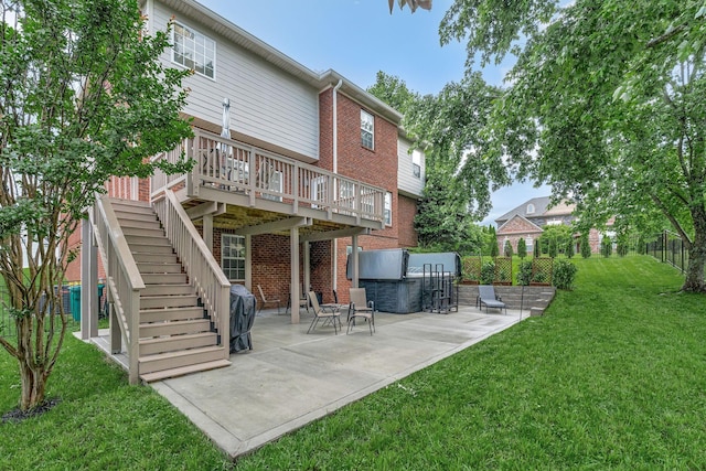 3168 Appian Way, Spring Hill, TN 37174 - rear view of house with brick siding, a patio, a deck, a lawn, and stairway