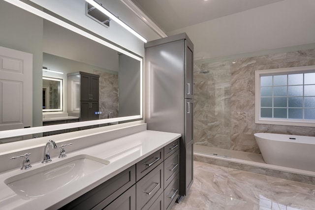 3168 Appian Way, Spring Hill, TN 37174 - bathroom featuring a soaking tub, vanity, a stall shower, and marble finish flooring
