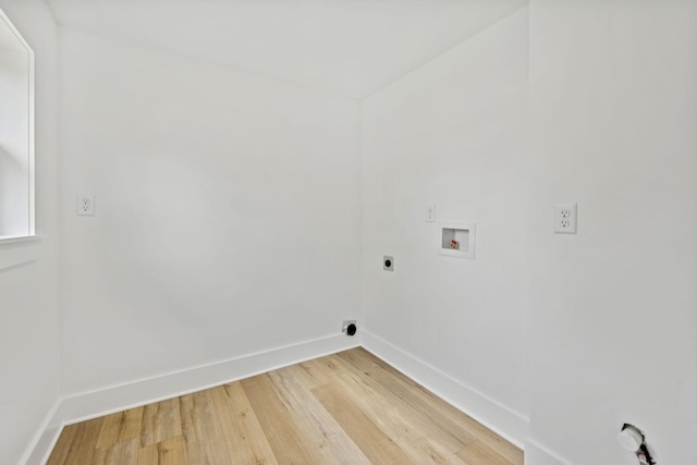 1775 Hayshed Rd, Charlotte, TN 37036 - laundry area with hookup for an electric dryer, light wood-style floors, and hookup for a washing machine