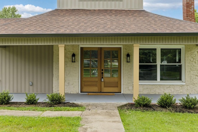 1775 Hayshed Rd, Charlotte, TN 37036 - entrance to property featuring a shingled roof, a chimney, a porch, and french doors