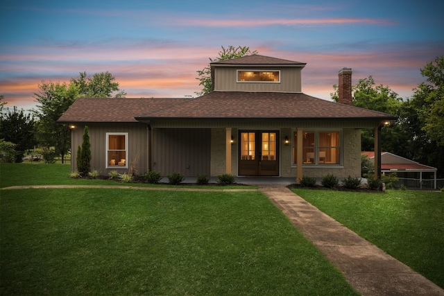 1775 Hayshed Rd, Charlotte, TN 37036 - view of front of property with a chimney, a shingled roof, a lawn, and a porch