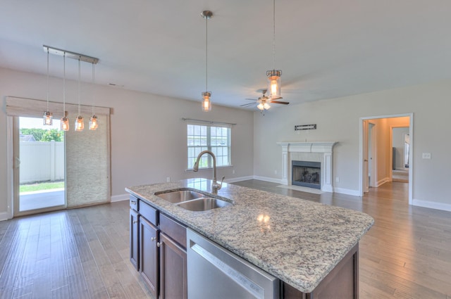 2009 Tulu Ct, Murfreesboro, TN 37128 - kitchen with a sink, stainless steel dishwasher, ceiling fan, and light wood-style floors