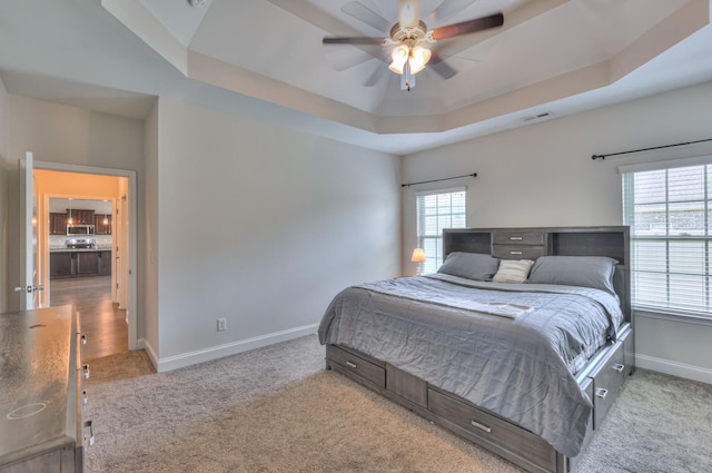 2009 Tulu Ct, Murfreesboro, TN 37128 - bedroom featuring carpet flooring, a tray ceiling, baseboards, and a ceiling fan