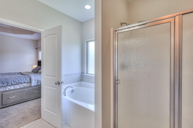 2009 Tulu Ct, Murfreesboro, TN 37128 - bathroom featuring connected bathroom, plenty of natural light, a garden tub, and a stall shower