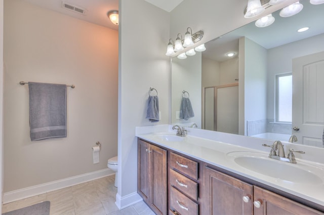 2009 Tulu Ct, Murfreesboro, TN 37128 - full bathroom with a stall shower, double vanity, toilet, baseboards, and a bath