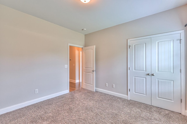 2009 Tulu Ct, Murfreesboro, TN 37128 - unfurnished bedroom featuring carpet flooring, a closet, and baseboards