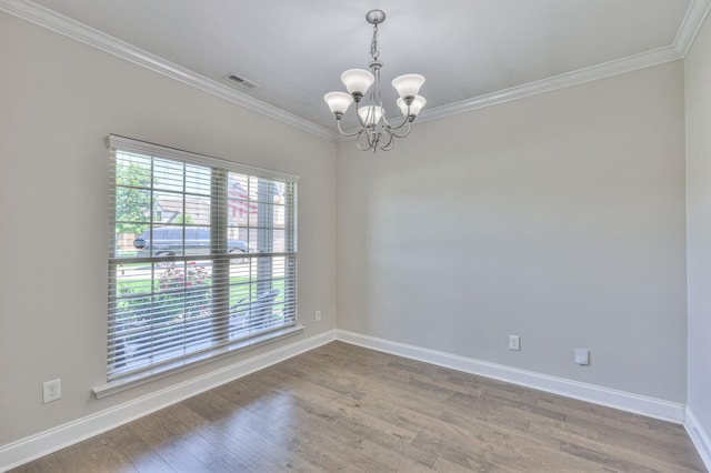 2009 Tulu Ct, Murfreesboro, TN 37128 - spare room featuring a chandelier, ornamental molding, baseboards, and wood finished floors