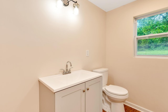 1318 Hwy S Unit 341, Chickamauga, GA 30707 - bathroom with toilet, vanity, wood finished floors, and baseboards