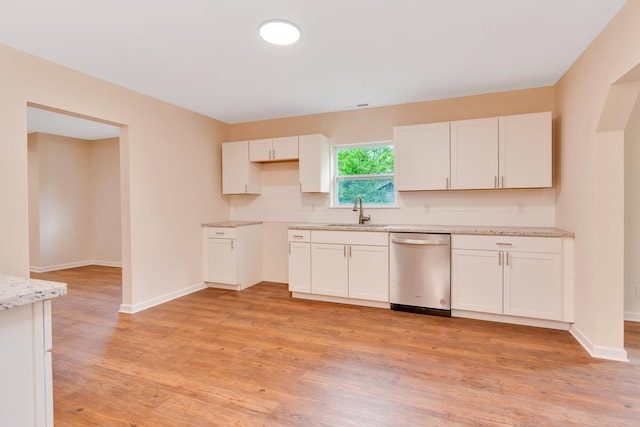 1318 Hwy S Unit 341, Chickamauga, GA 30707 - kitchen with dishwasher, a sink, white cabinets, light wood-type flooring, and baseboards
